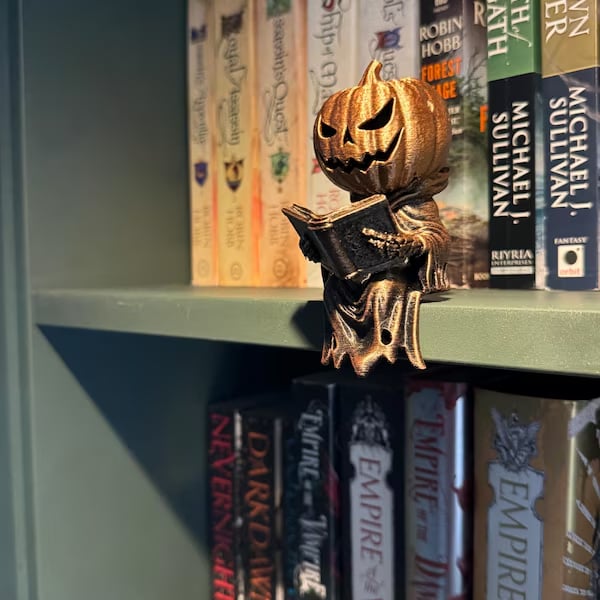 Reading Pumpkin Shelf Sitter