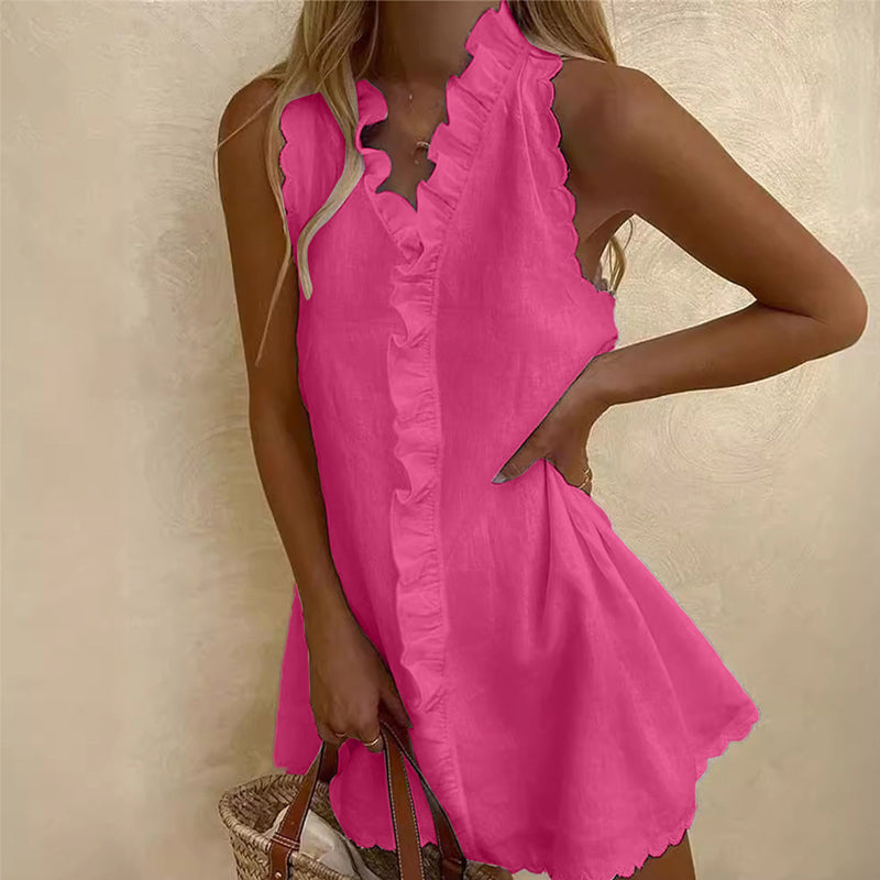 Short women's dress with ruffle details and front button closure