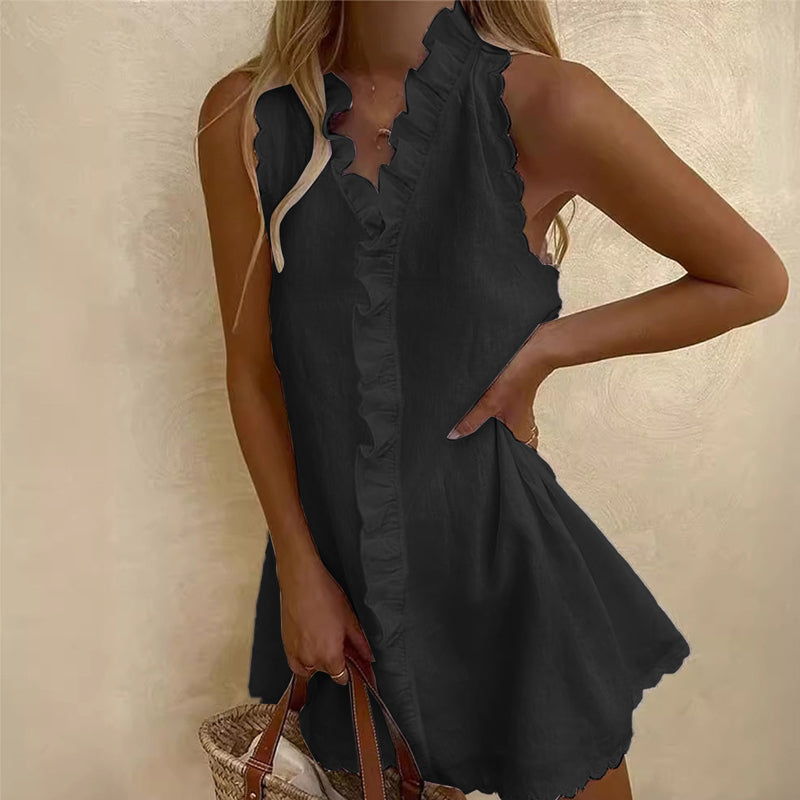 Short women's dress with ruffle details and front button closure